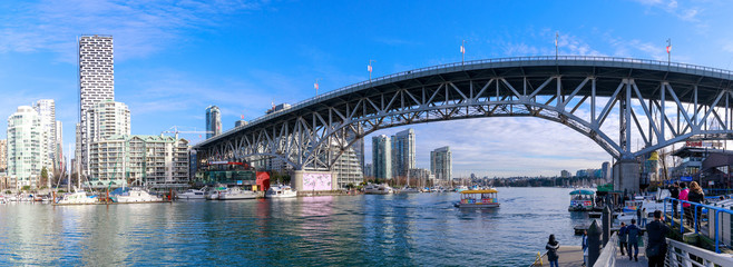 View of Vancouver BC next to Granville Bridge along False Creek