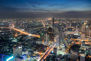 Fototapeta na wymiar Cityscape of crowded building with light traffic at Bangkok city