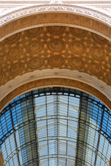 MILAN, ITALY - SEPTEMBER 28, 2018: Gallery Vittorio Emanuele II, luxury shopping mall. It was designed and built by architect Giuseppe Mengoni between 1865 and 1867