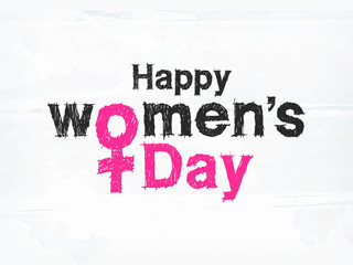 Fototapeta na wymiar Scribble text Happy Women's Day on white texture background. Can be used as poster or banner design.
