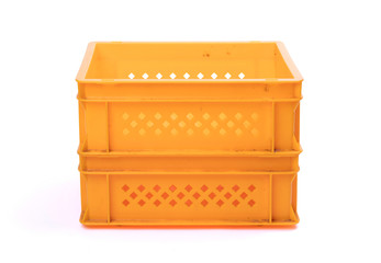 Empty yellow plastic crates
