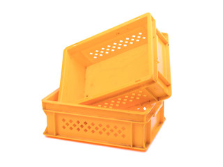 Empty yellow plastic crates