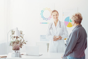 Female doctor smiling at her patient in the office