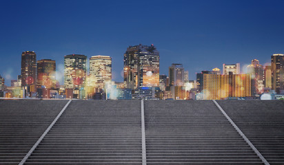 Japan, Osaka city at night with colorful lights and Bokeh and concrete stairways. City background	