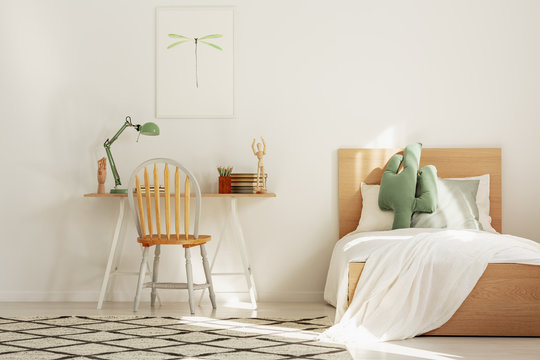 White and wood scandinavian kid's room with bed and workspace