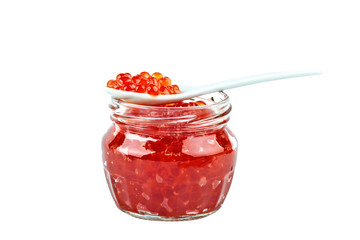 Red caviar in a glass container. Isolated object on white background.