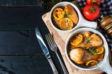 roasted chicken legs with vegetables and herbs