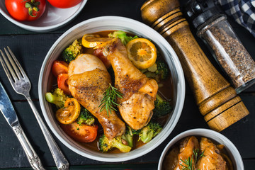 roasted chicken legs with vegetables and herbs