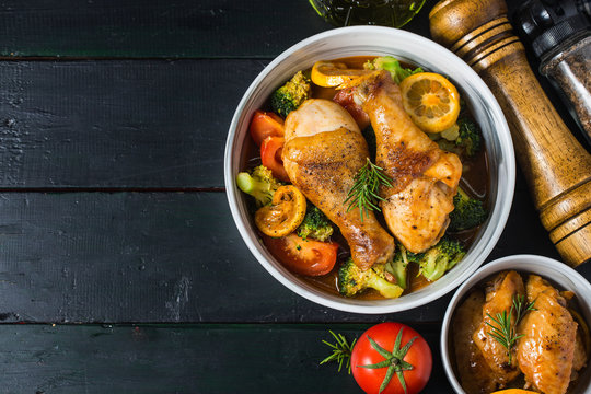 roasted chicken legs with vegetables and herbs