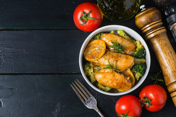 Grilled chicken wings with vegetables and herbs