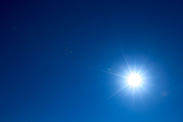 blue sky background with tiny clouds