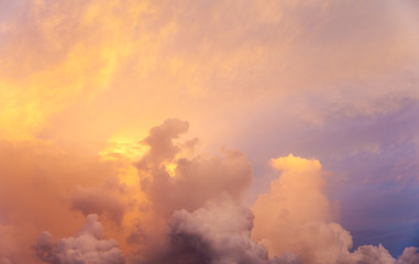 Sunset with sun rays, sky with clouds and sun.