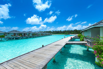 Maldives water bungalow on ocean water landscape