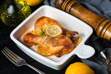 roasted chicken legs with vegetables and herbs