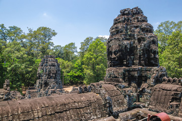 Fototapeta na wymiar Anciente stone heads in Bayon temple in Angkor Wat, Cambodia.