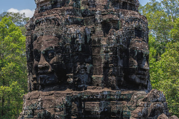 Fototapeta premium Anciente stone heads in Bayon temple in Angkor Wat, Cambodia.