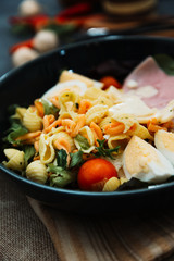 Fresh fruits salad and ham with egg