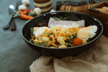 Fresh fruits salad and ham with egg
