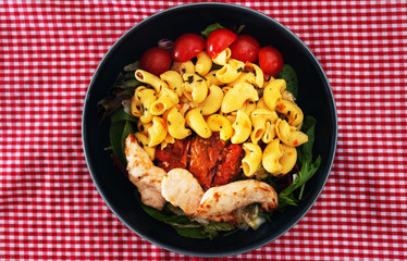 pasta and chicken on the table