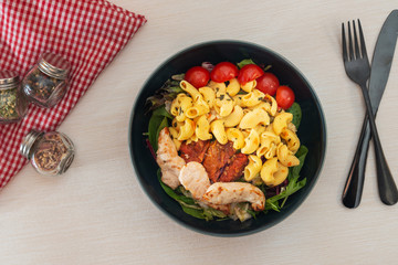 pasta and chicken on the table