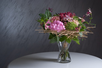 close up of wedding bouquet on white table and gray backgroind. Nice decoration