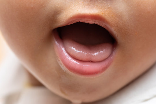 Closeup of a child's open mouth