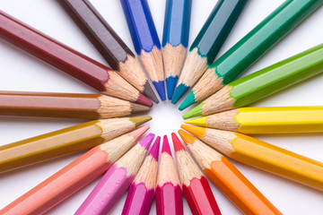 Crayons are close together in a round