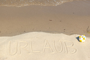 Botschaft im Sand - Urlaub