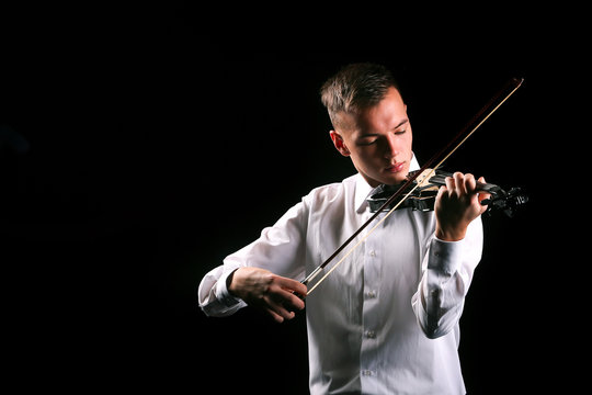Young men playing the violin