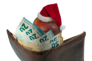 Leather wallet with cash and a Christmas hat