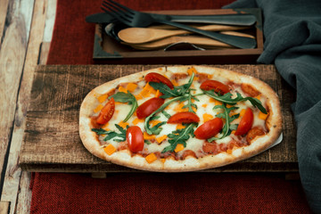 pizza with mozzarella, emmental and cheddar cheese