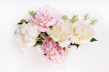 Delicate white pink peony with petals flowers and white ribbon on wooden board. Overhead top view, flat lay. Copy space. Birthday, Mother's, Valentines, Women's, Wedding Day concept