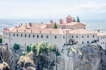 Naklejka premium Kalambaka, Greece - June 10, 2018: A group of Orthodox monasteries Meteora, near the town of Kalambaka at the northwestern edge of the Plain of Thessaly.