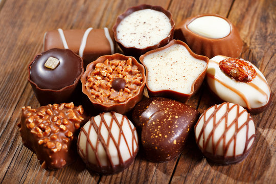 chocolate candies on wooden table