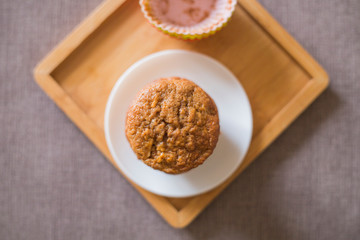 Tasty cupcakes on table in kitchen