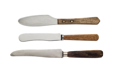 Vintage knives with wooden handles isolated on a white background