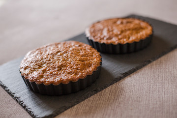 homemade tasty cooked cakes on table