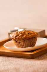 Tasty cupcake on table in kitchen