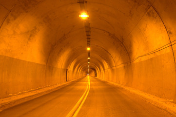 Highway tunnel road on yellow natural light