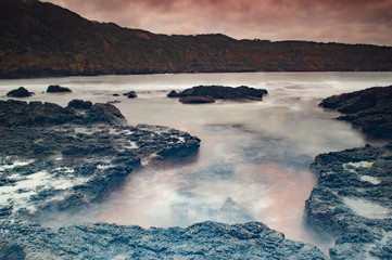 Naklejka premium Sea Beach with Rocky Coastline