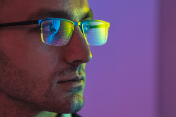 The portrait of the handsome man in glasses