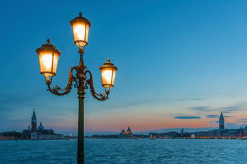 Classical street light in the lagoon of Venice, Italy