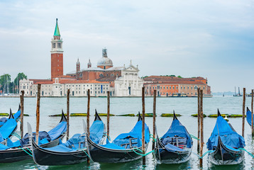 Fototapeta na wymiar Gondola floating in Grand Canal, Venice, Italy