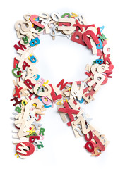 Colorful wood alphabet letters on white background,letter R