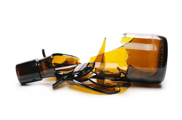 Glass shards, broken bottle of beer isolated on white background, clipping path