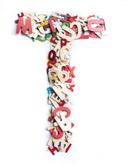 Colorful wood alphabet letters on white background,letter T