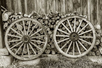 Fototapeta na wymiar wheel and firewood of farm house in Historic Village Shirakawa-go, Japan