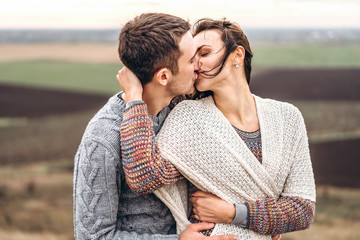 Romantic young couple spending time together outdoor.