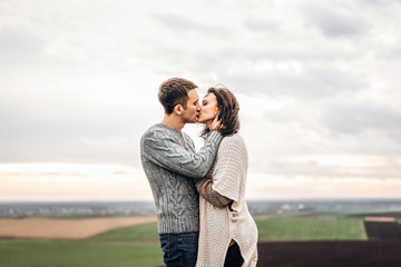 Romantic young couple spending time together outdoor.