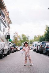 Little boy dressed in mummy in the street